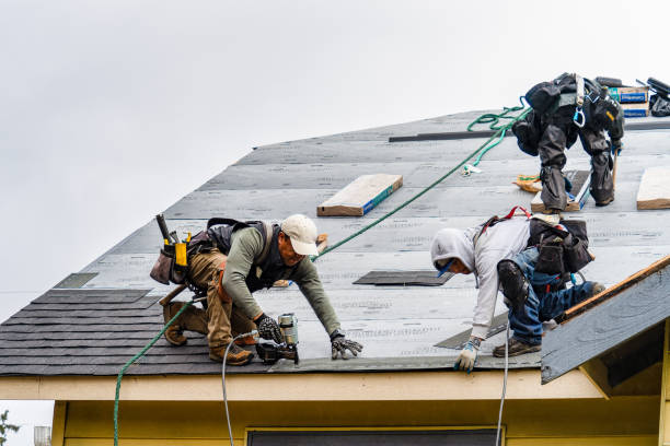 Professional Roofing technician working in Belford, NJ